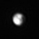 Illustration for article titled Is That A Massive Stripe Streaking Across Plutos Surface?